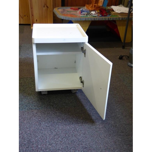 43 - Small white plastic storage cabinet on wheels