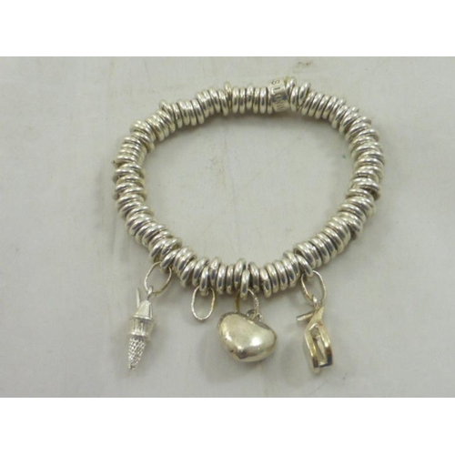 161 - Silver Ring Bracelet with various Charm's