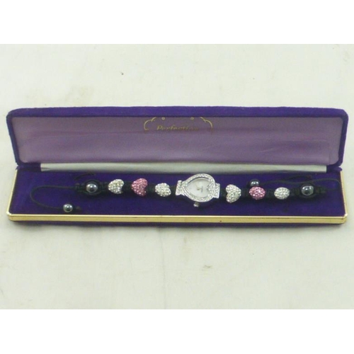 202 - Sekonda Ladies diamante strapped watch in presentation case