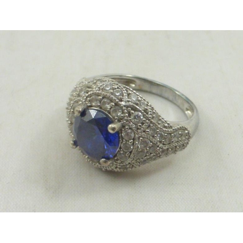 210 - Silver 925 Art Deco Style Ring with CZ and Blue Stone Decoration Size 6.5 complete with Presentation... 