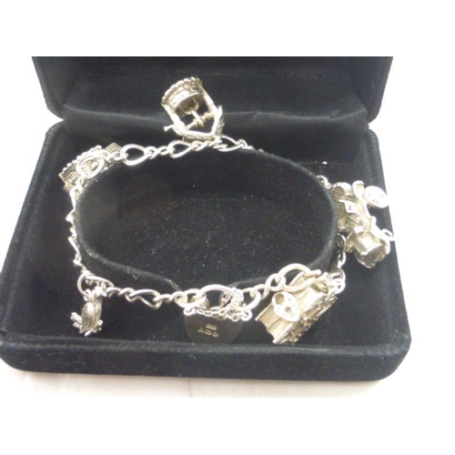 214 - Silver Bracelet with Large Selection of Charms including Presentation Box