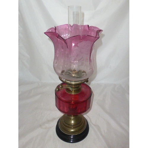 147 - Antique Brass and Cranberry Glass Paraffin Lamp