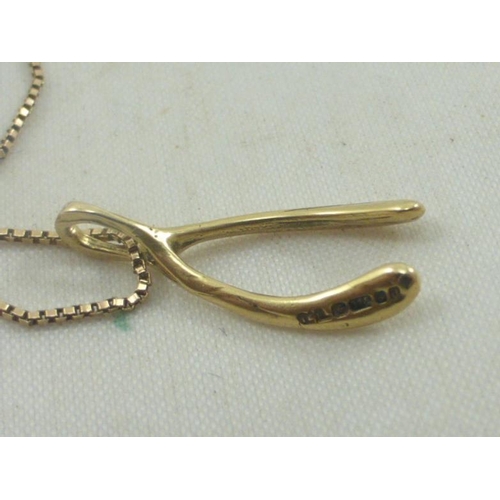 230 - Hallmarked 375 Gold Wish Bone Pendant and Chain (2.1 Grams) in Presentation Box