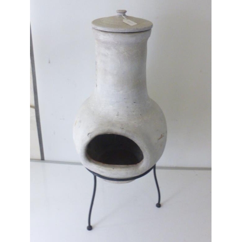 473 - Terracotta chiminea on metal stand