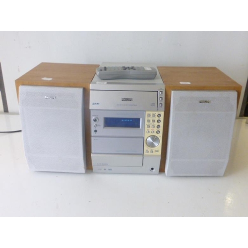 493 - Philips Micro HiFi  System Good Working Order with remote control, Speakers and handbook.