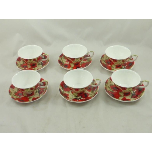 381 - Twelve Piece Heritage Tea Set with Poppy Decoration