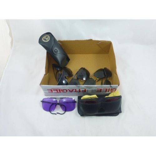 579 - Collection of sport sunglasses to include one pair with interchangeable coloured lenses