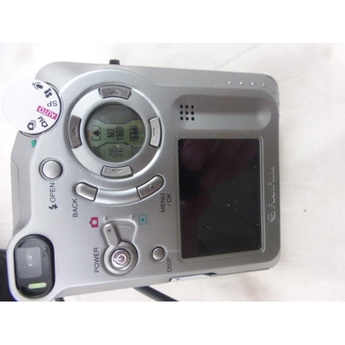 201 - FujiPix 4800Z Digital Camera complete with Docking Station, Charger and Leads