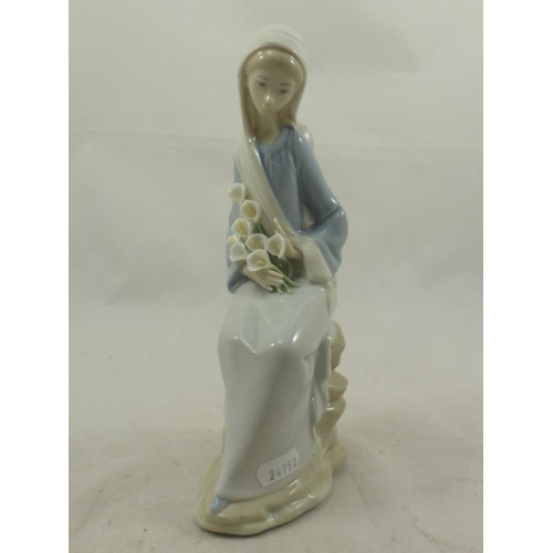 355 - Lladro Figure of Lady holding flowers