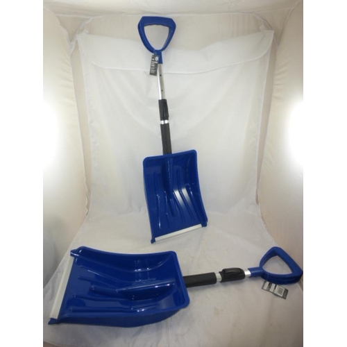 79 - Pair of New Extendable Snow Shovels