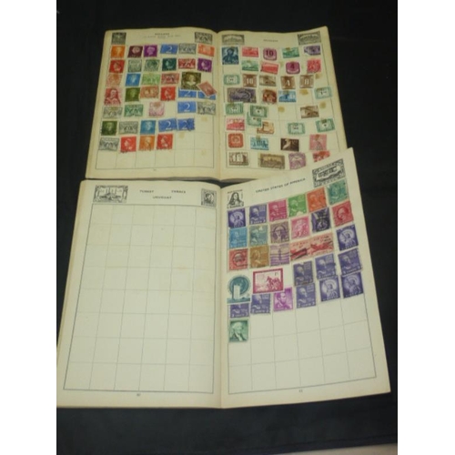 211 - Two Western Mounty Stamp albums to contain a collection of Various world stamps