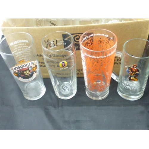 396 - Large collection of Various branded glasses to includes Stella Artois, strongbow and others