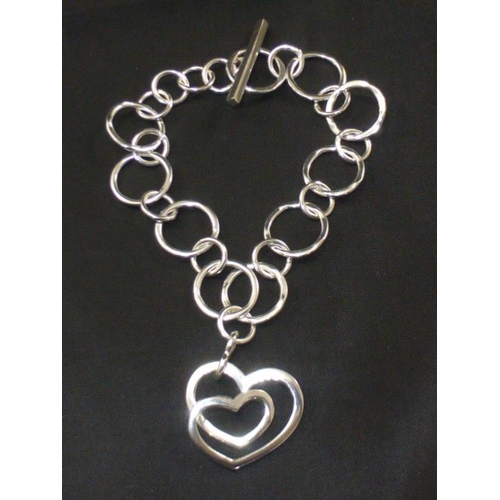 109 - Silver Bracelet with entwined Hearts Decoration