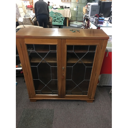 543 - Antique mahogany  leaded front glass display cabinet complete with key (120cm x 31cm x 110cm)