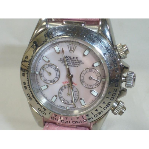 685 - Replica Ladies Rolex oyster watch with pink face and strap