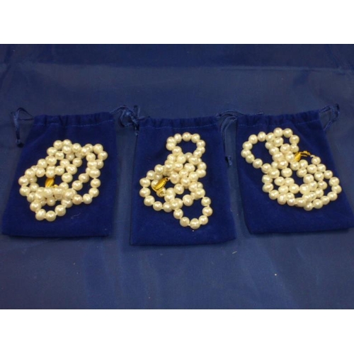 692 - Three Faux Pearl Necklaces with Gold Plated Clasps and Pouches