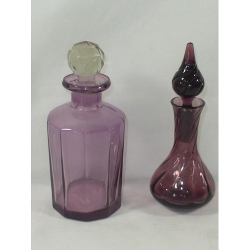 147 - Two Purple Glass perfume bottles complete with Stoppers