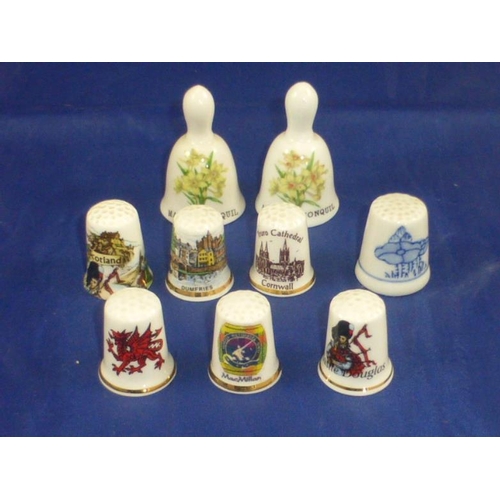 104 - Selection of 9 Ceramic Thimbles including Two Bells