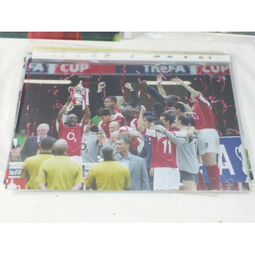 106 - Collection of Press release photo's of Arsenal FA CUP winners 2004