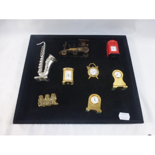 110 - Mixed Tray of Collectibles Including Miniture Clocks, Spark Plug Themed Train and More