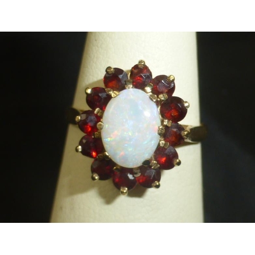 126 - Hallmarked Birmingham 375 Gold Ring with mounted Pearl and Ruby Decoration