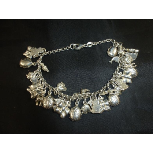 68 - Sterling Silver Charm Bracelet