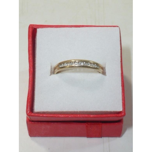 107 - Gold 375 Ring with .15 Carat Diamond Band (Size O)