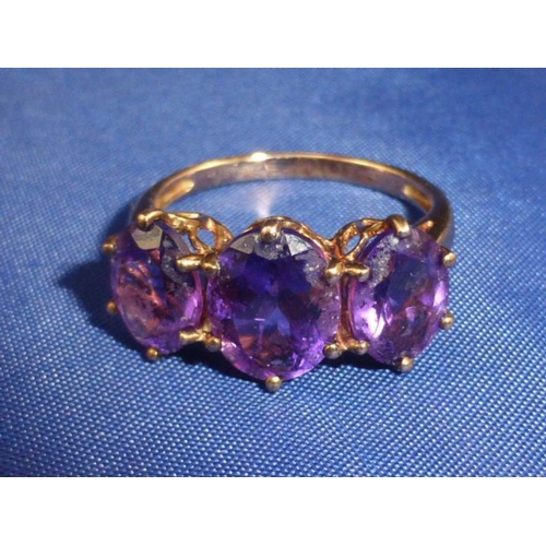 111 - Hallmarked 375 Gold Ring Decorated with Amethyst Stones (Size N)