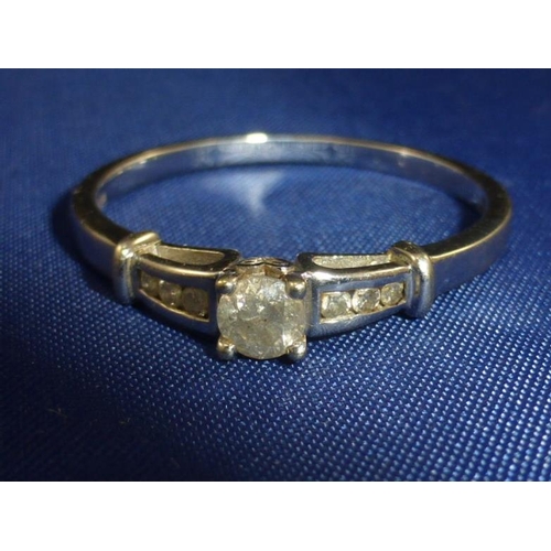 163 - Hallmarked 375 White Gold Ring with Mounted .25 carat Diamond Solitaire (Size U)