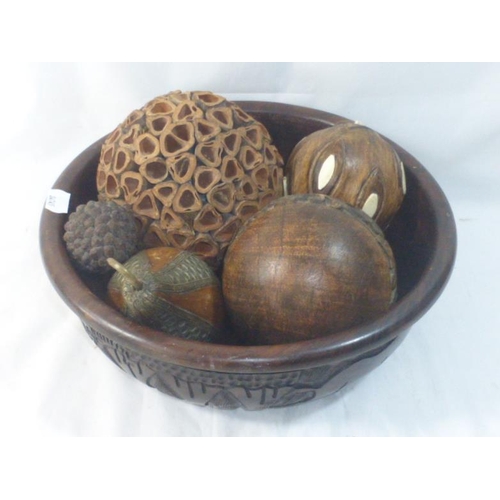 286 - Large wooden Carved animal themed bowl with various treen items to include Pear