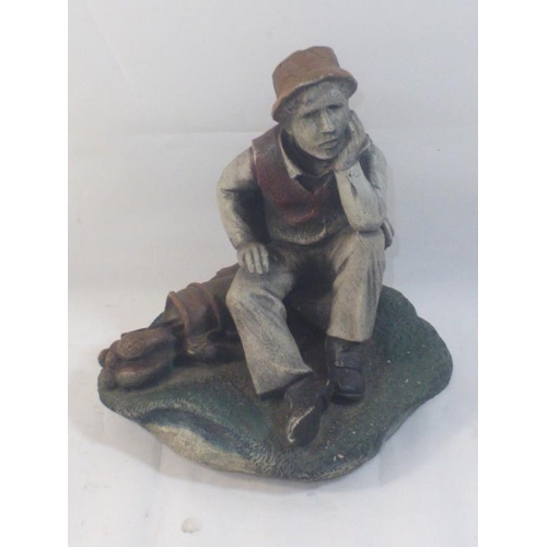 38 - Golfing figure (Signed to Base)