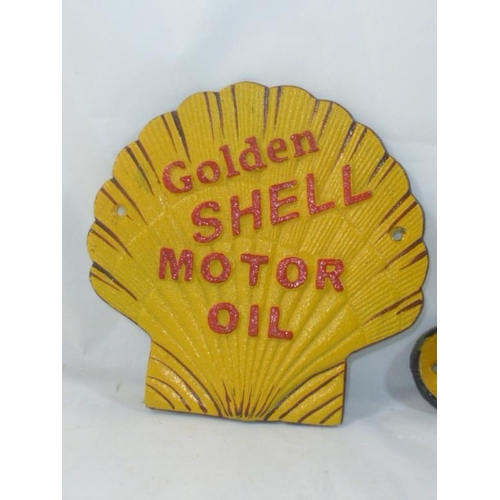 64 - Two Cast Iron Shell Motor Oil Wall Signs