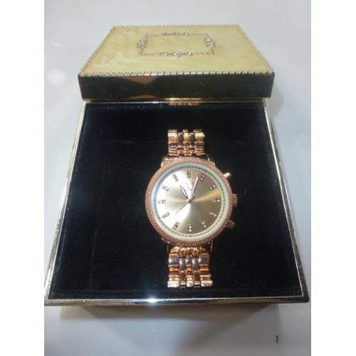 63 - AP London Gold Tone Wrist Watch and Case