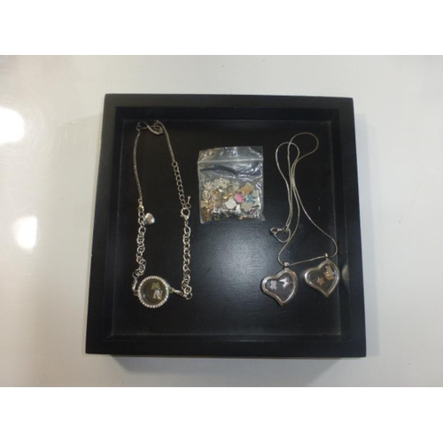 148 - Two Necklaces with Opening Pendant's and Selection of Internal Charm's