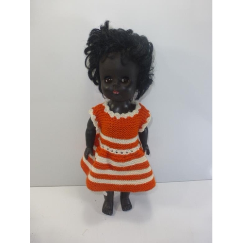 232 - Vintage Black Doll with hard plastic body, arms and legs, soft rubber head, eyes with eyelids and Ma... 