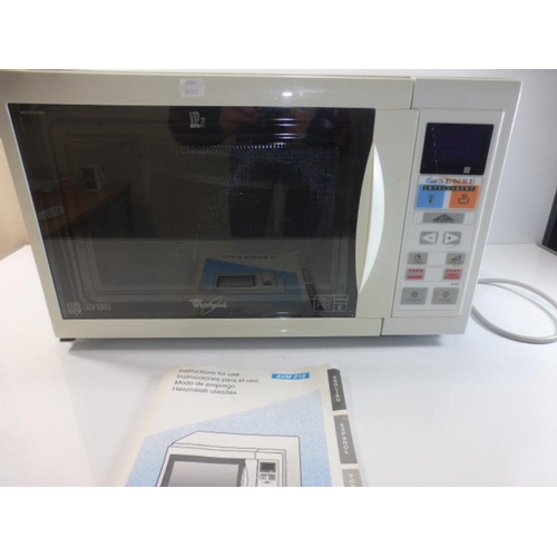 389 - A Whirlpool 1000 Watt Combination Microwave with Grill