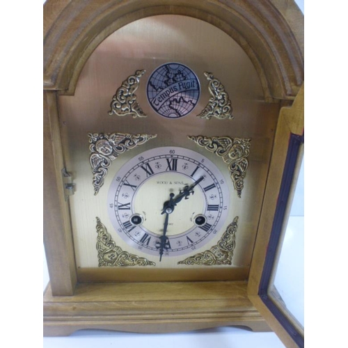 134 - Decorative Mantle clock with Pendulum and Key & Chinese Movement