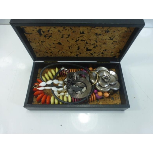 263 - A Cork Lined Trinket Box with Costume Jewellery