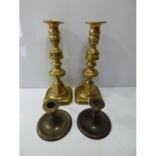 67 - Two Pairs of Brass Candlesticks