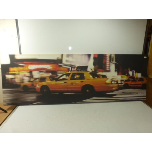 68 - Two Canvas on Block pictures depicting Yellow Taxi's