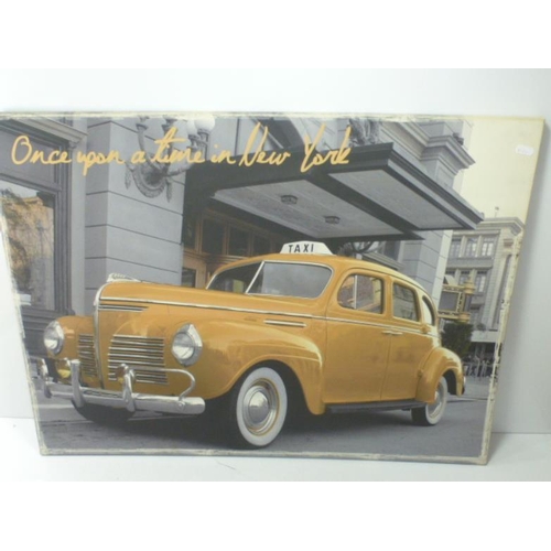 68 - Two Canvas on Block pictures depicting Yellow Taxi's