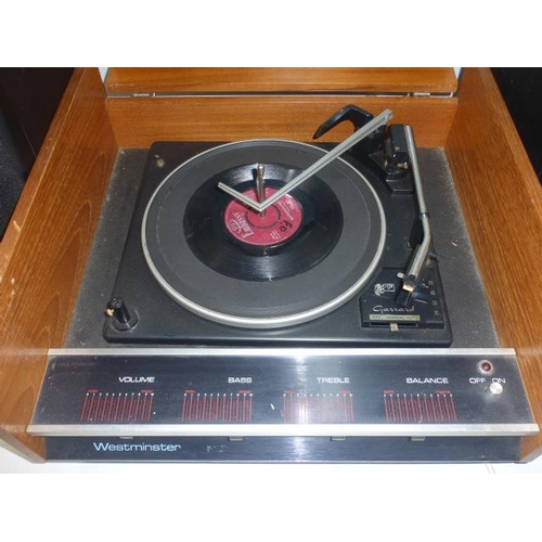 41 - A Westminster 72 Record player by Bergson. Fitted with a Garrard  2025t Four Speed Turntable