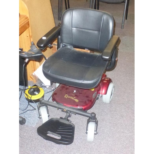 613 - Rascal powerchair model P321 in excellent cosmetic condition, metallic red and black with charger in... 