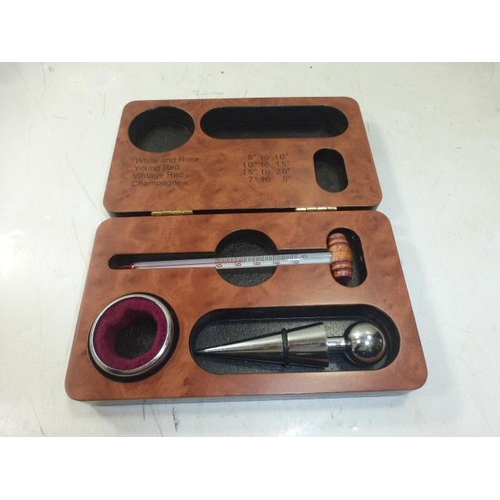 338 - Wine Bottle cased set to include Thermometer, wine stopper and more