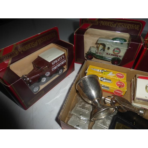 91 - Four Boxed Matchbox Collectors Vehicles and a Collectors tray including Spark Plugs, Match Books and... 