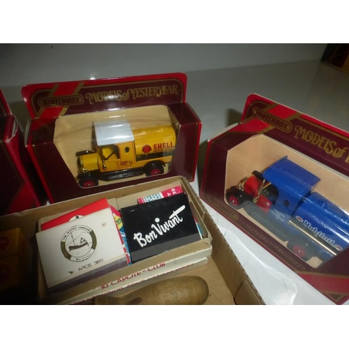 91 - Four Boxed Matchbox Collectors Vehicles and a Collectors tray including Spark Plugs, Match Books and... 