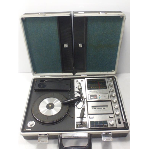 34 - Sanyo Vintage  1970's Original briefcase record and cassette player with Radio.  Takes 6 size D Batt... 