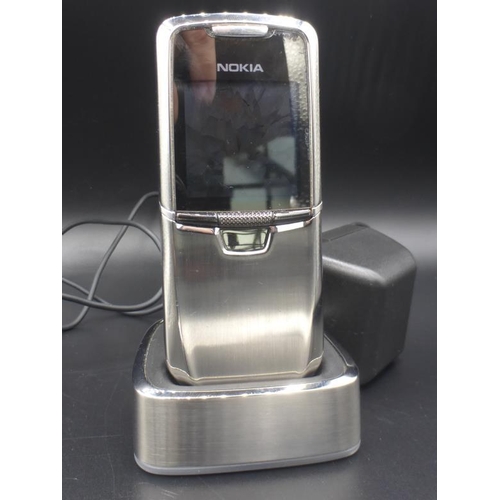 56 - Nokia 8800 Slide Special Edition Silver Stainless Steel complete with Charger (Powers On)