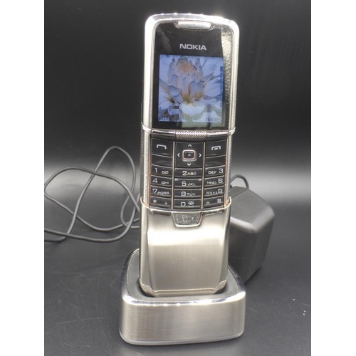56 - Nokia 8800 Slide Special Edition Silver Stainless Steel complete with Charger (Powers On)