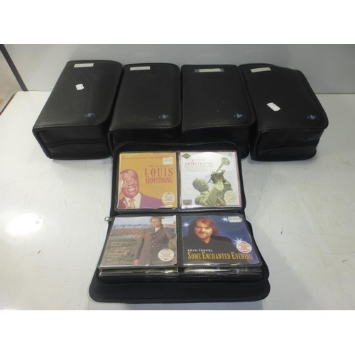 158 - 5 x Black CD/ DVD cases full of music CD'S